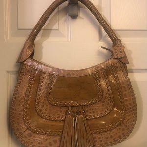 Tan patent leather statement purse
